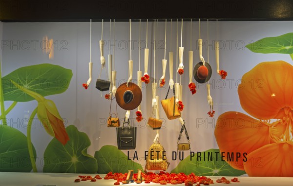 PARIS, FRANCE, MARCH 27, 2017: Fashion accessories in the showcase of the Printemps department