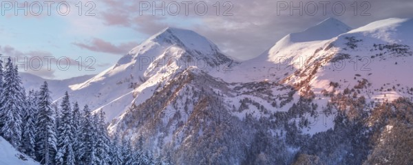 Pirin, Bulgaria winter travel vacation nature panoramic background with snow covered mountain peaks