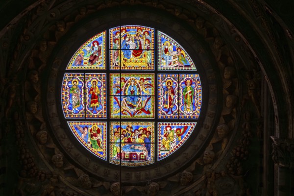 SIENA, ITALY, SEPTEMBER 23, 2023, Rich ornate window with mother mary above the presbytery of the