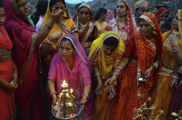 Women performing aarti of raj Gangaur Mehrangarh Fort Jodhpur rajasthan, India, Asia