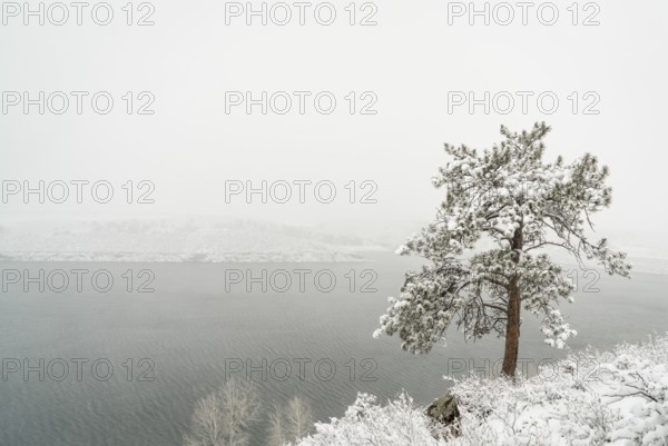 Mountain lake in a heavy April snowstorm - Horsetooth Reservoir in Fort Collins, Colorado