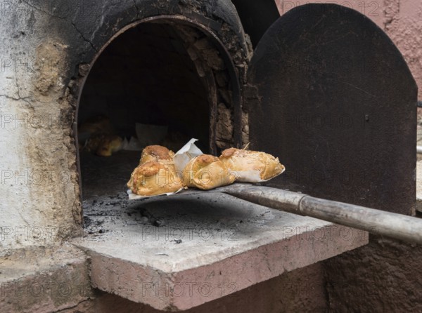 Traditional Cypriot easter pastries made with mixture of various cheese and halloumi and cooked on