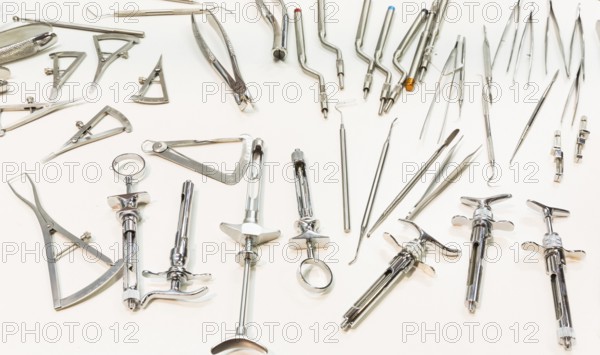 Dental instruments for stomatology practice. Tweezer, carver, wiper, drill, pincers, scraper,