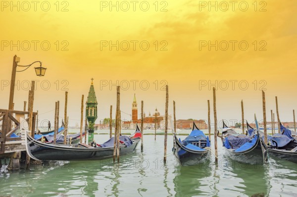 Gondolas near Saint Mark Square (Piazza San Marco) and church of San Giorgio di Maggiore in the