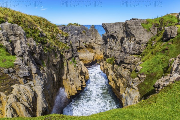 Picturesque coast of the South Island of New Zealand. Pancake rocks form narrow bays and fjords.