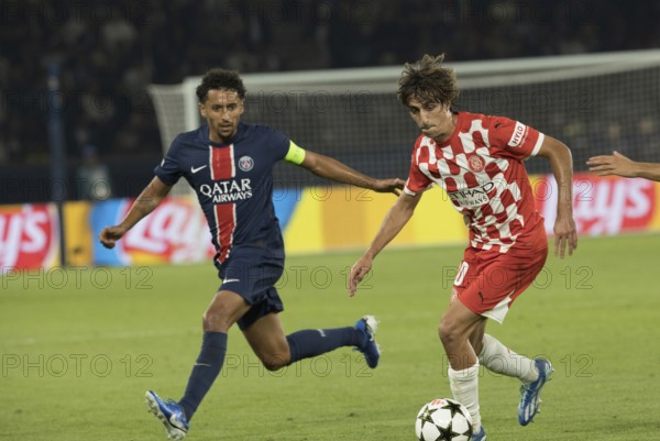 Football match, Bryan GIL Girona FC right on the ball fighting with MARQUINHOS Paris St. Germain,