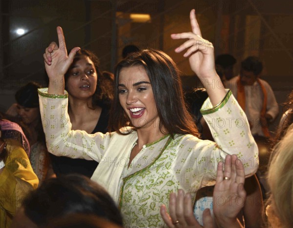 Bollywood actor Amy Jackson participates in a procession for the immersion of an idol Hindu god