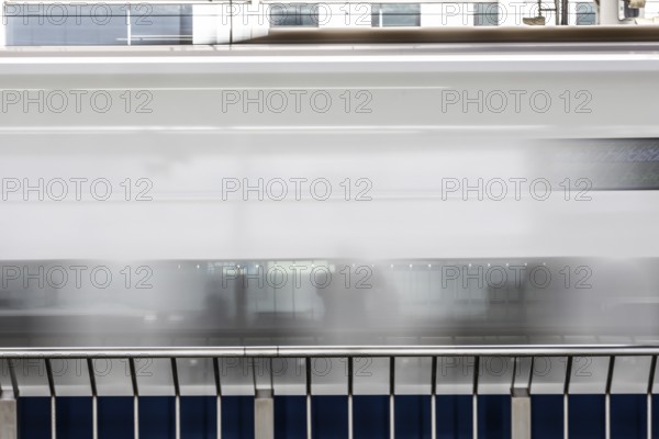 KYOTO, JAPAN - SEPTEMBER 24 2024: A Shinkansen high-speed bullet train arriving at Kyoto Station in