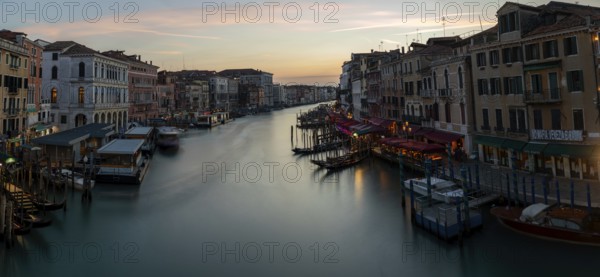 Evening light at sunset, view over the Grand Canal, from the Rialto Bridge, long exposure,