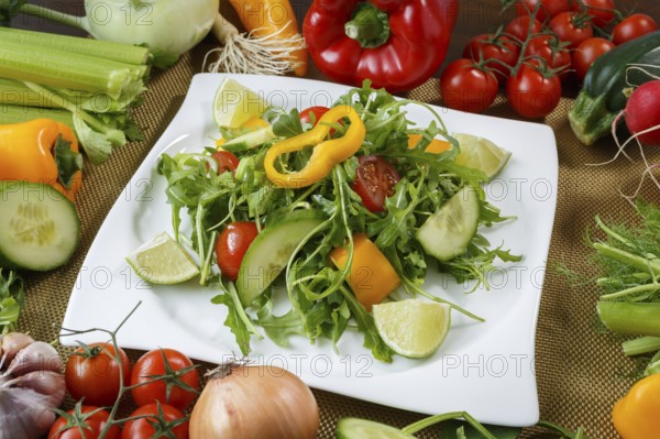 Healthy eating background. Different vegetables and salad with leaf vegetables and cherry tomatoes