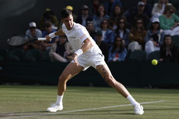 Australian tennis player Thanasi Kokkinakis in action at the 2024 Wimbledon Championships, London,