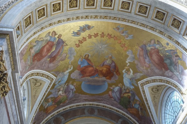 Ceiling fresco in a church with angels and a heavenly scene on a golden background, szentendere,