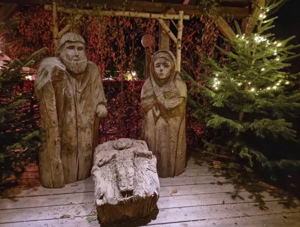 Traditional Christmas nativity scene with figures made out of wood, the birth of Jesus Christ in