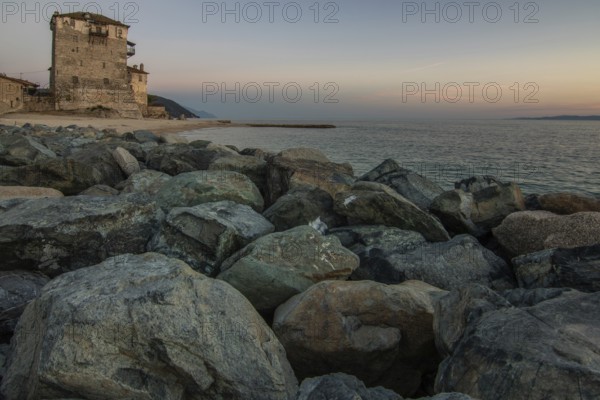 View over the sea into the sunset. Landscape taken with the historical landmark of the Byzantine