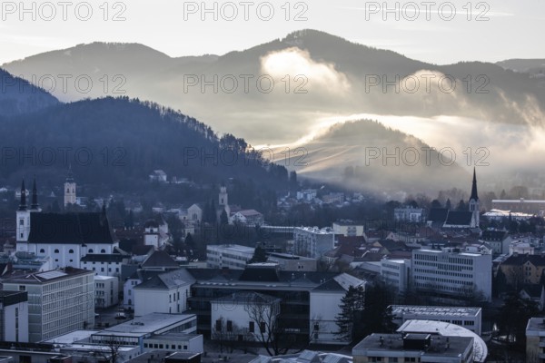 Morning atmosphere and morning fog over the Calvary, churches of Leoben, Leoben, Styria, Austria,