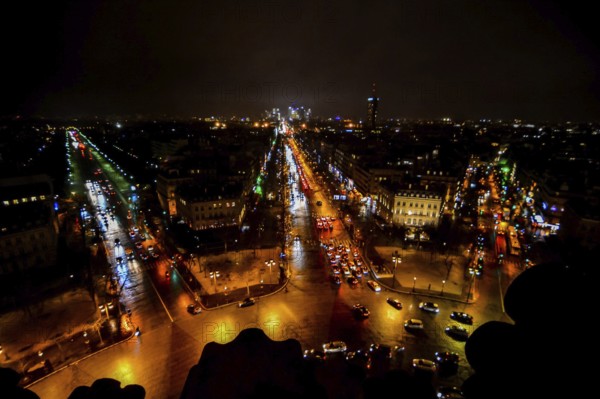 View from Arc de triomphe at night, Photo image a Beautiful panoramic view of Paris Metropolitan