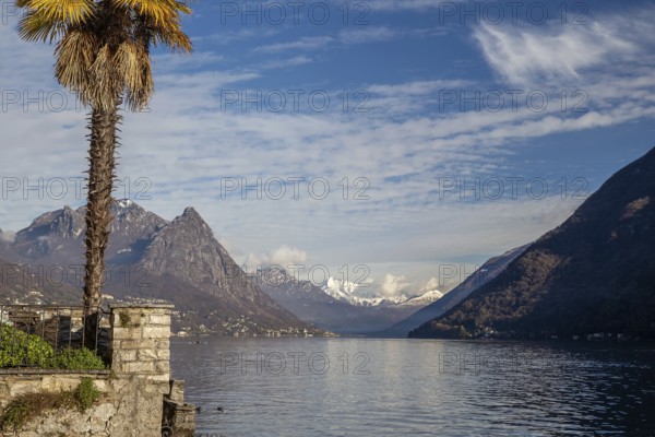 Amazing view from Castagnola (suburb of Lugano) on Gandria and in distance snowcapped mountains of