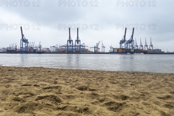 Hamburg with Elbe, beach harbour cranes, industry, loading, trade, customs, maritime trade,