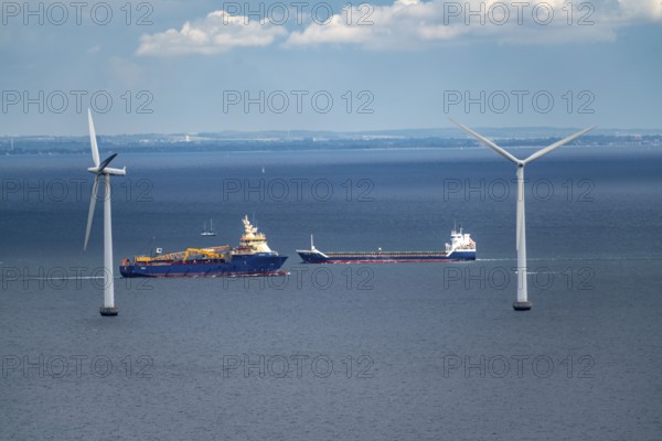 Wind turbines, offshore wind farm east of Copenhagen, in Øresund, cargo ship, Nordhavn, Denmark,