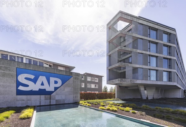 Logo and building of the listed software company SAP, headquarters. Walldorf, Baden-Württemberg,