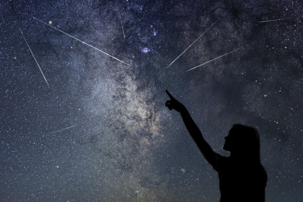 Silhouette of young girl watching Meteor Shower
