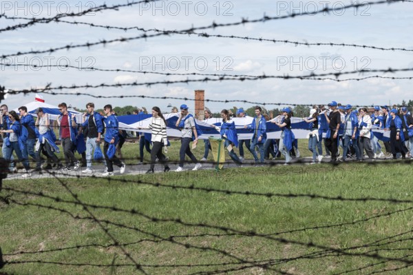 OSWIECIM, POLAND - MAY 6, 2024: March of the Living on the site of the former Auschwitz Birkenau