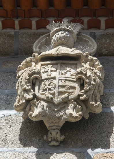 Stonework carving of noble family coat of arms, 15 Rua de Donas, city of Guimaraes, northern