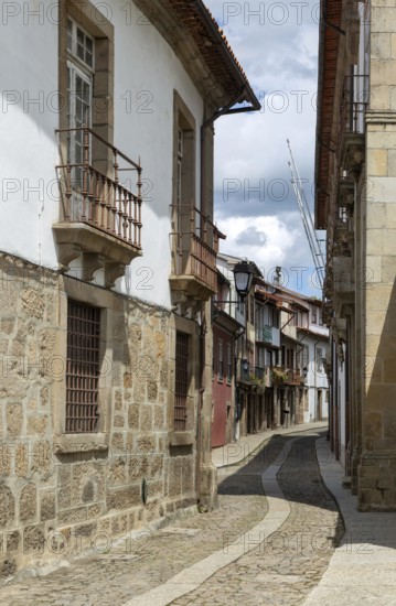 Street of historic buildings with balconies, Rua João Lopes de Faria, city centre Guimaraes,