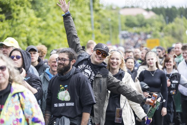 Festival visitors in front of the main entrance at the Rock am Ring Festival on Friday, Nürburgring