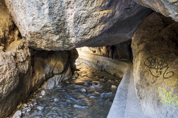 Hiking path Los Cahorros de Monachil, along the Rio Monachil river, narrow path in the river gorge,