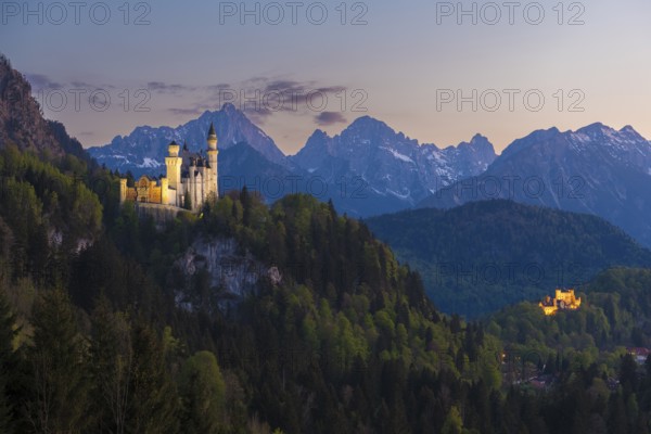 Two castles in an idyllic mountain landscape at sunset, Neuschwanstein, Hohenschwangau, Schwangau