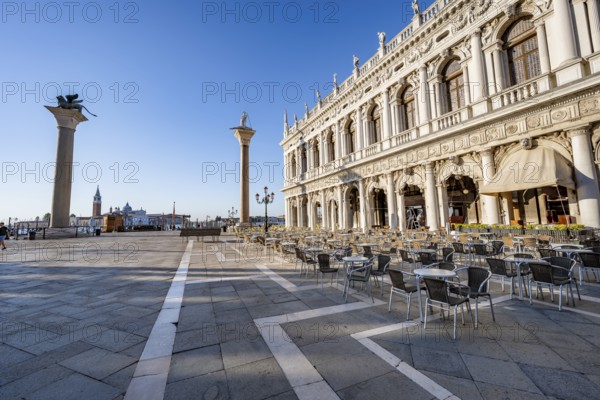 Chairs and tables of cafes at Piazetta San Marco, Colonna di San Marco and Colonna di San Todaro,