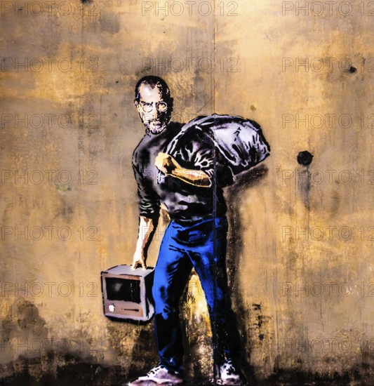 Banksy - Steve Jobs as a Syrian refugee in a refugee camp, 2015, The Jungle Refugee Camp, Calais,