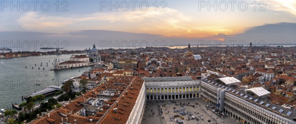 Panorama, St Mark's Square and Basilica di Santa Maria della Salute on the Grand Canal at sunset,