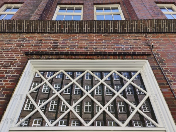 Reflection of the façade of the Sprinkenhof, Brick Expressionism, Kontorhausviertel, UNESCO World