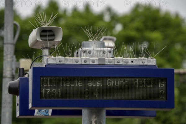 Display board, at a station, train cancellation announcement due to construction work, display