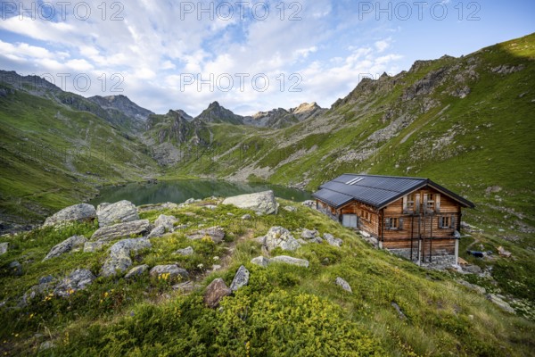 Cabane du Louvie mountain hut and Lac du Louvie mountain lake, Valais Alps, Val de Bagnes, Valais,