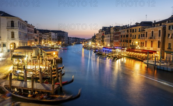 View of the Grand Canal at the blue hour, picturesque evening mood with illuminated palazzos on the