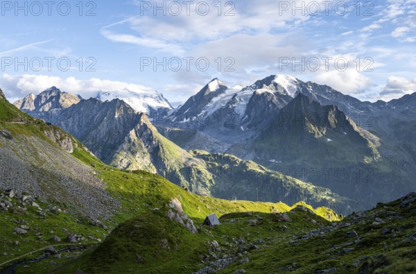 View from the Cabane du Louvie to the glaciated mountain peaks of the Grand Combine, in the evening