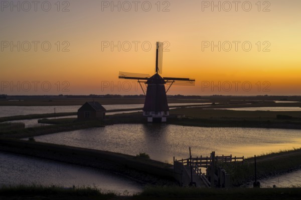 1878 windmill Het Noorden, traditional polder mill, smock mill near Oosterend on the island Texel