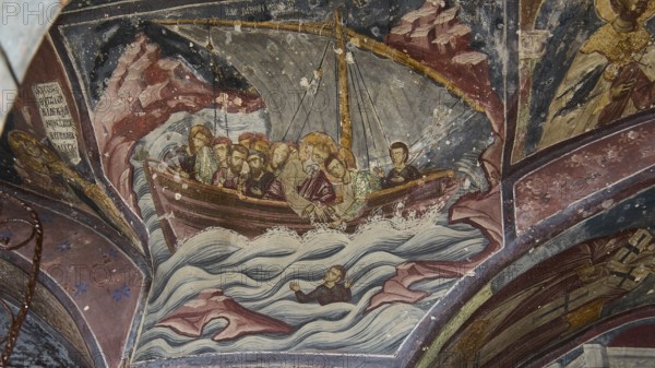 Medieval fresco of a boat with saints on a stormy sea, Apostle John sailing from Ephesus to Patmos,