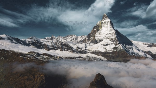 Panoramic view of the Matterhorn, typical cloud formation
