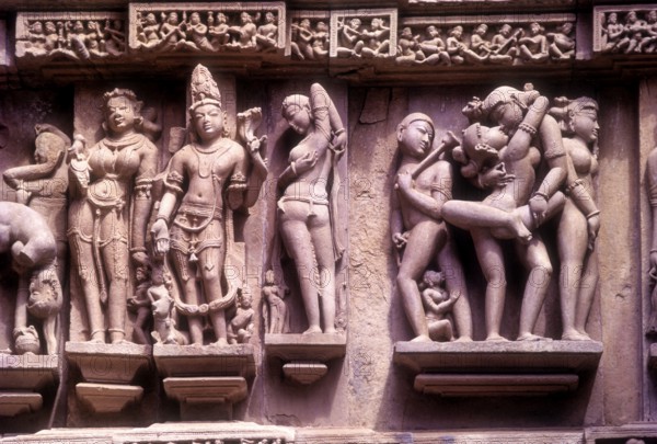 Erotic sculptures on South Facade, Lakshmana temple in Khajuraho, Madhya Pradesh, India, Asia.