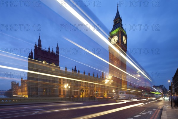 Big Ben in the evening. Dabldekker passes and leaves a line of light at slow shutter speeds.