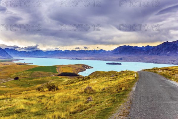 New Zealand, South Island. Lake Tekapo on cloudy day. The lake in the mountains. Travel to a