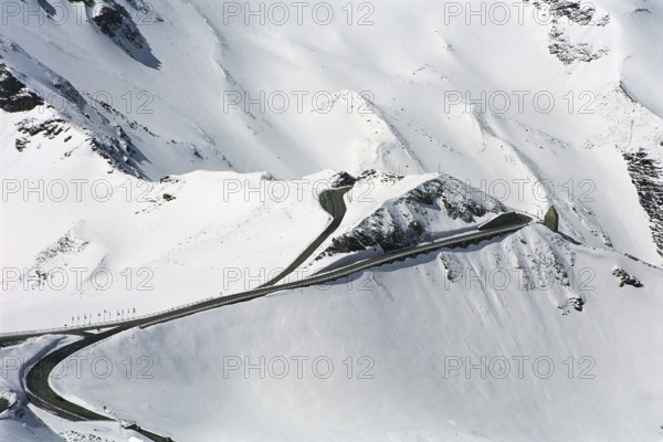 The famous Grossglockner mountain road leads throug snow-covered mountains. Hohe Tauern National