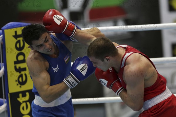 Sofia, Bulgaria. 27th February, 2021. Ruslan Kolesnikov (red) of Russia and Dilshodbek Ruzmetov of