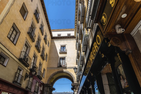 Madrid, Spain, June 1, 2019: Toledo Street near Plaza Mayor. Low angle view of old buildings,