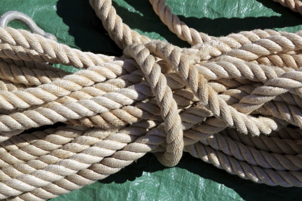Marine clear white rope over green background