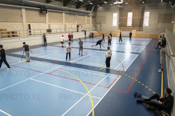 February 21, 2019. Denmark. Copenhagen. Team game with stick and ball Floorball or hockey in hall.
